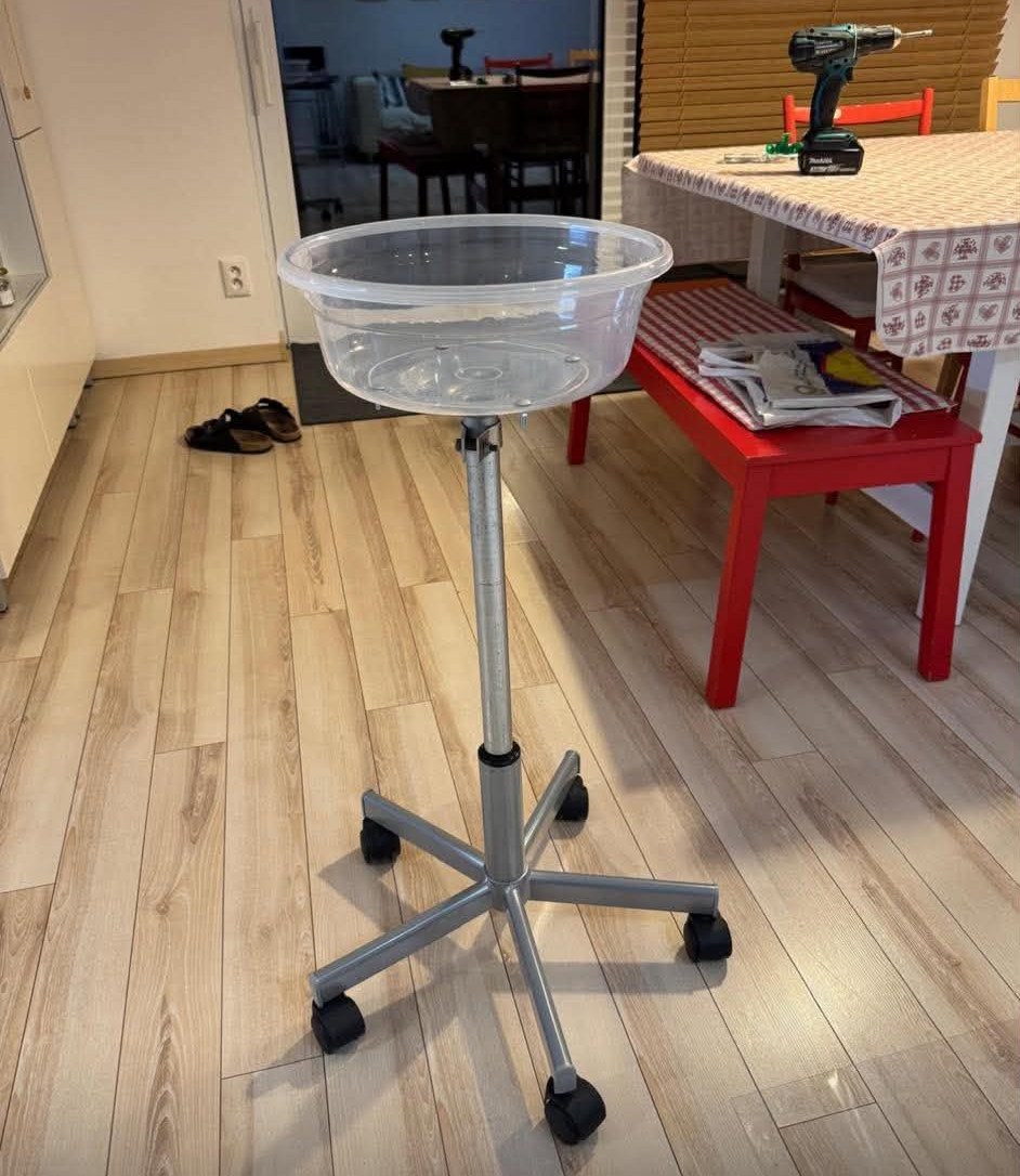 Finished DIY table tennis ball stand made from an office-chair base